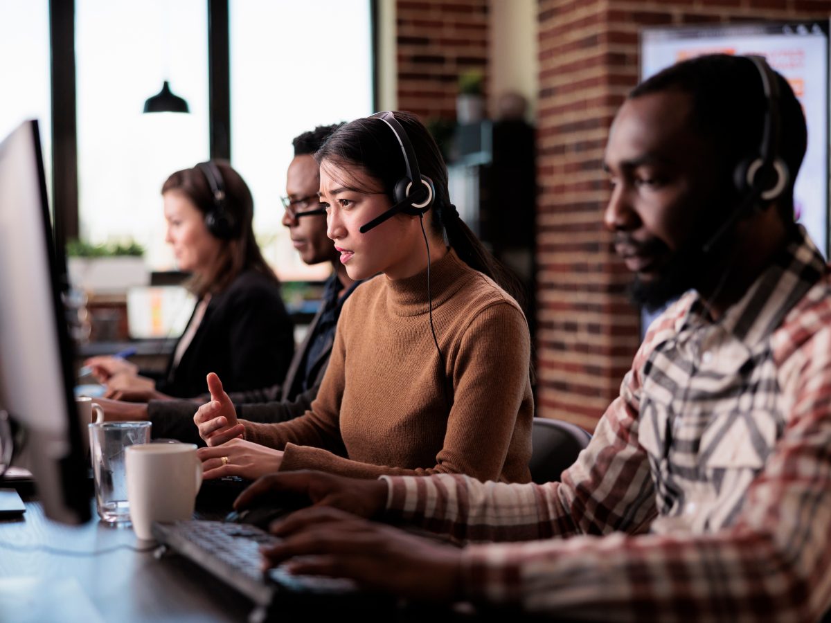 Telemarketing assistant working at customer service helpdesk